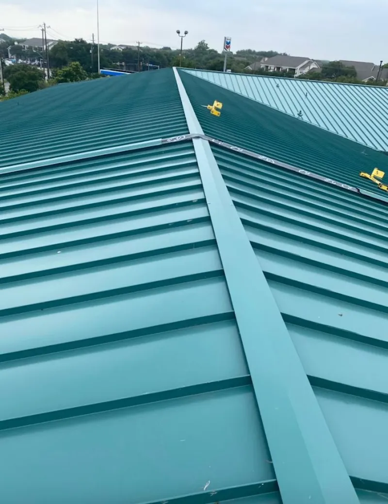 Green commercial metal roof ridge and valley for Metal Roof Repair in Windsor Locks