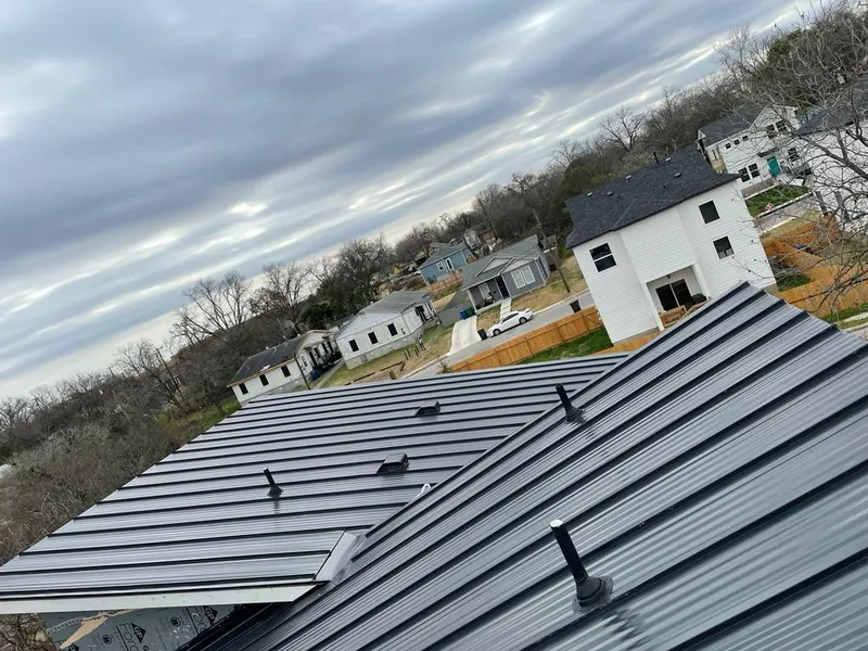 Standing seam metal roof panels with vents for Skylight Repair in Windsor Locks